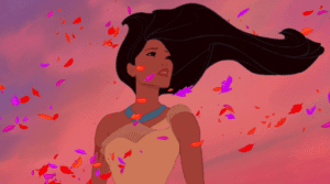 Pocahontas wearing a native american outfit being surrounded by purple and orange leaves.