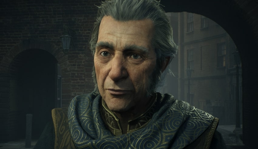 Professor Fig in Hogwarts Legacy with a golden scarf and brilliant gray hair.