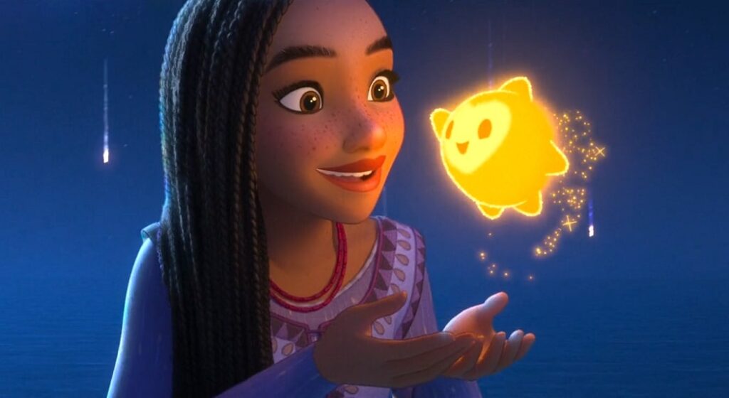 Asha looking at star who is sparkly and happy in Disney's Wish.